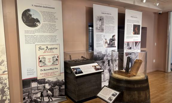 A wall of a large display describing the 400th anniversay celebration in St. Augustine