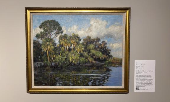 A painting of a Florida river on the wall at the Governor House exhibit